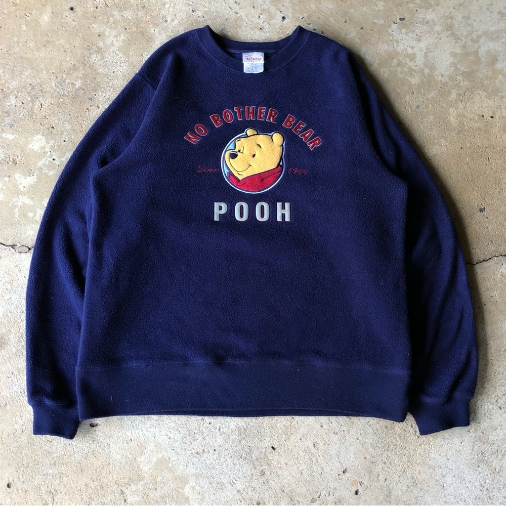 Vintage Disney Winnie the Pooh navy blue crewneck sweatshirt.